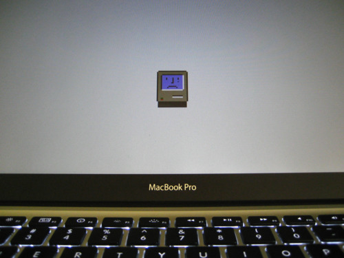 MacBook Pro with “sad mac” icon