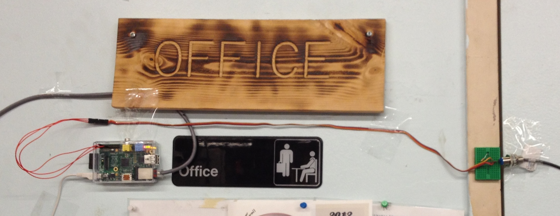 Raspberry Pi and sensor attached to wall